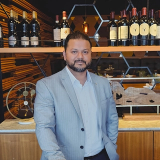 Nilmani Das, Manager at Proof Kitchen + Lounge