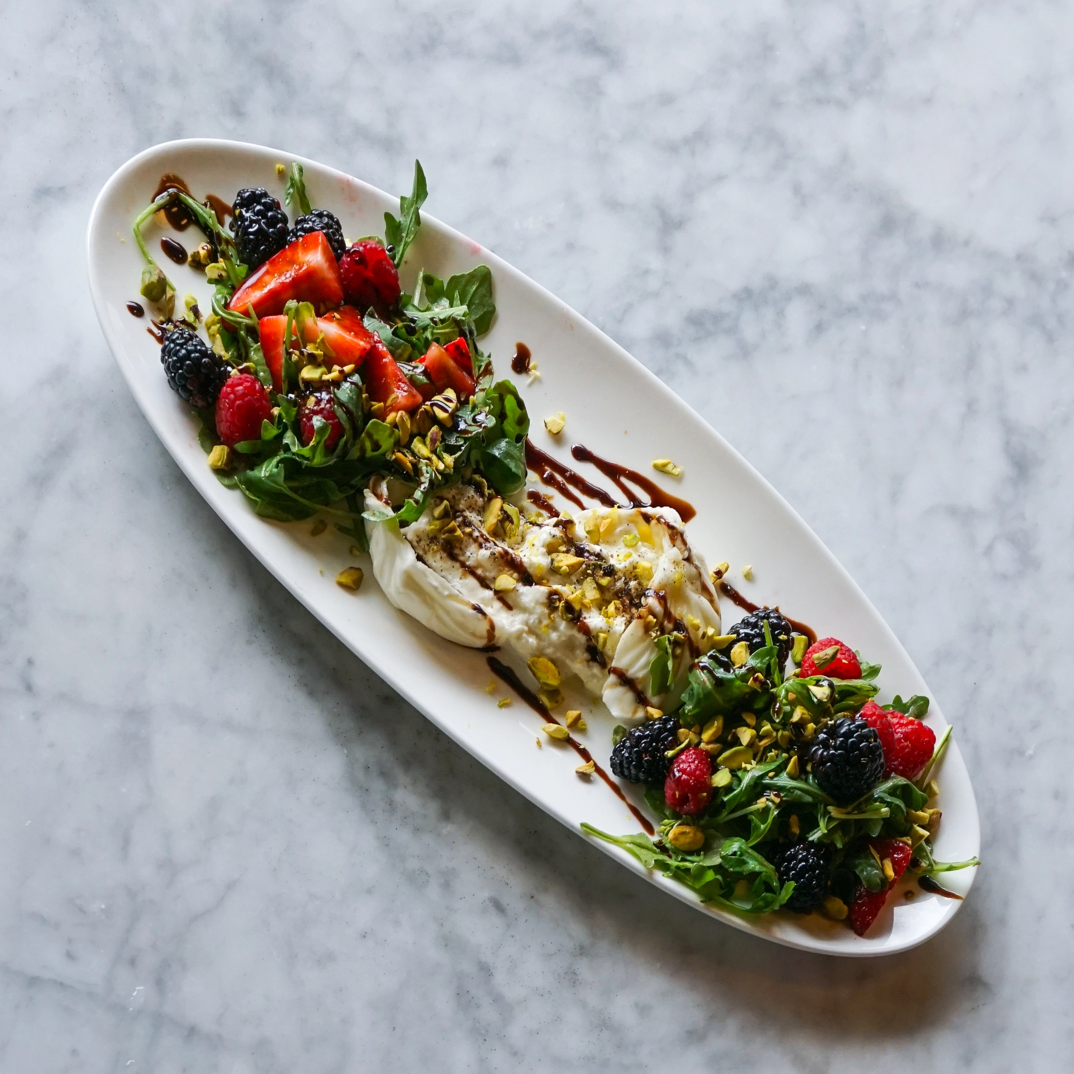 Summer Burrata Salad dish at Proof Kitchen + Lounge
