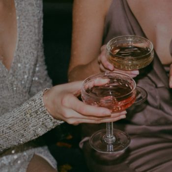 Women cheersing champagne