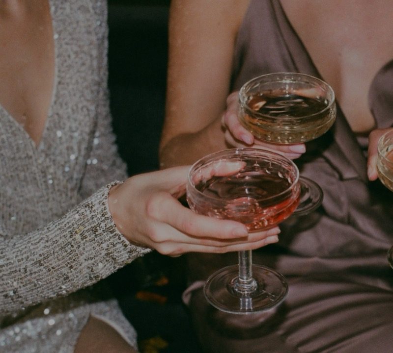 Women cheersing champagne